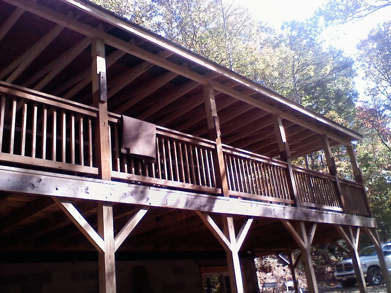 Timber framing under a new elevated porch and deck — Roof Leak Repair in Elk Mountain by Roofing Brothers